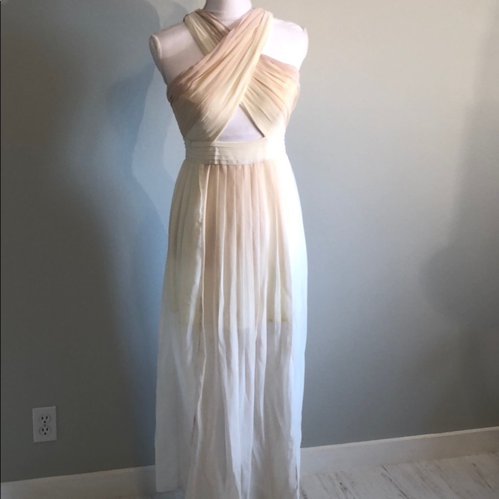 Blush, nude, and cream maxi dress cut out details